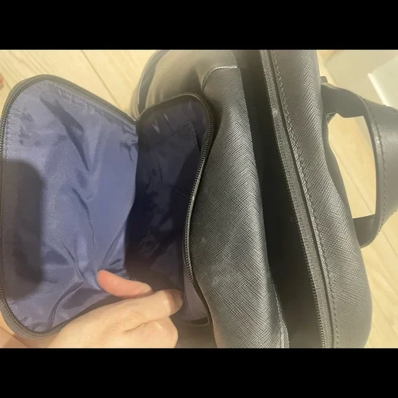 Tumi backpack in black leather